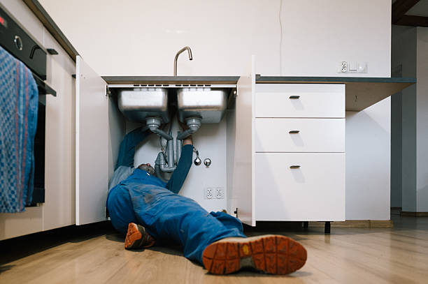 Professional Emergency Plumber technician working in Duquesne, PA
